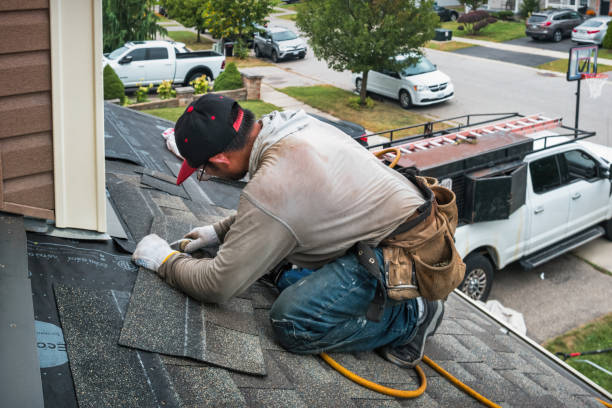 Professional Flat Roof Repair technician working in Claypool, IN